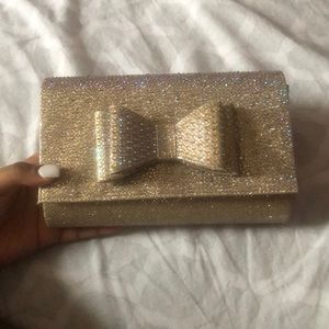 bedazzled bow clutch purse